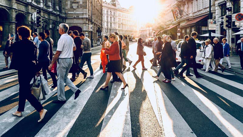 People crossing the road in a smart city