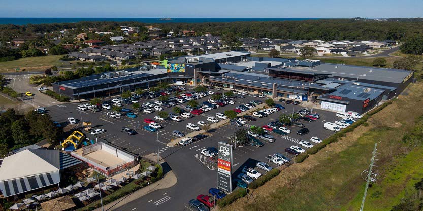 Aerial view of a shopping mall in a smart city