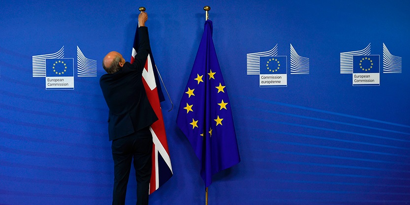 Man is taking down UK flag