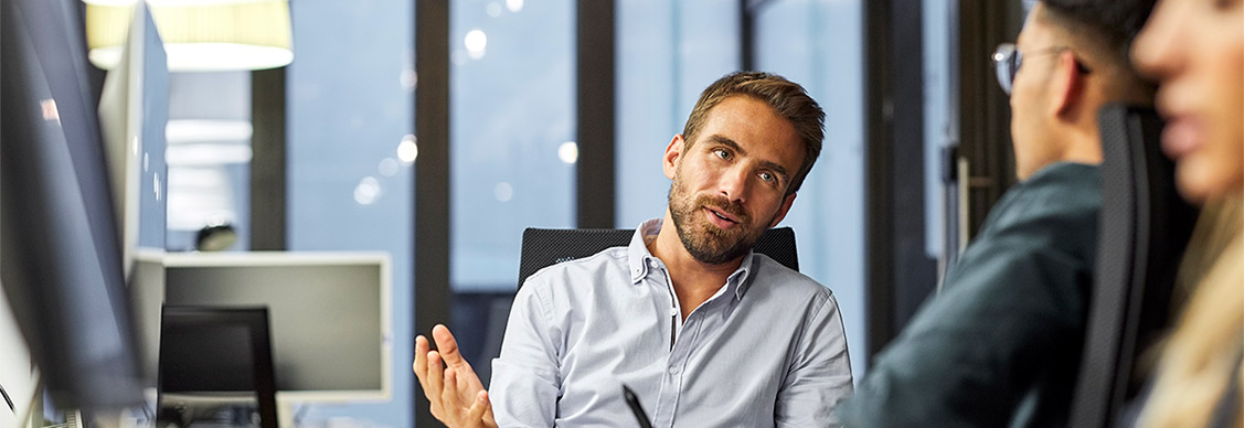 People discussing at office