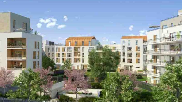 Residential building flats covered with greenery and security fence