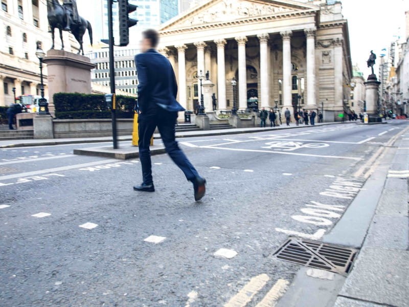 Picture of a man running on the street