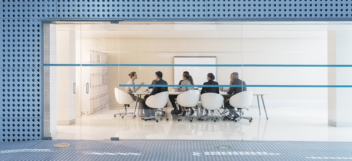 Employees doing work meetings in conference room